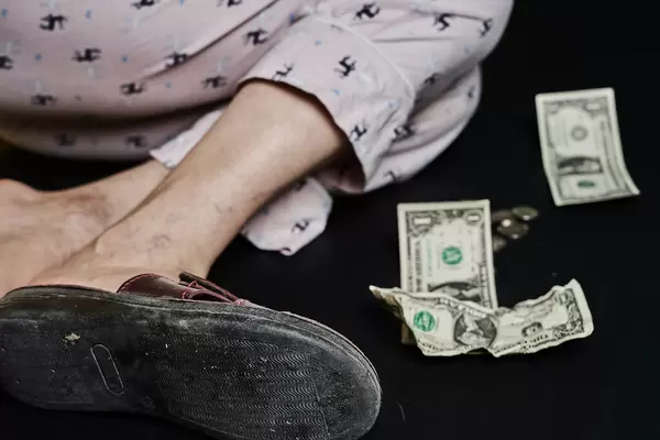 Homeless female in sleeping outdoors