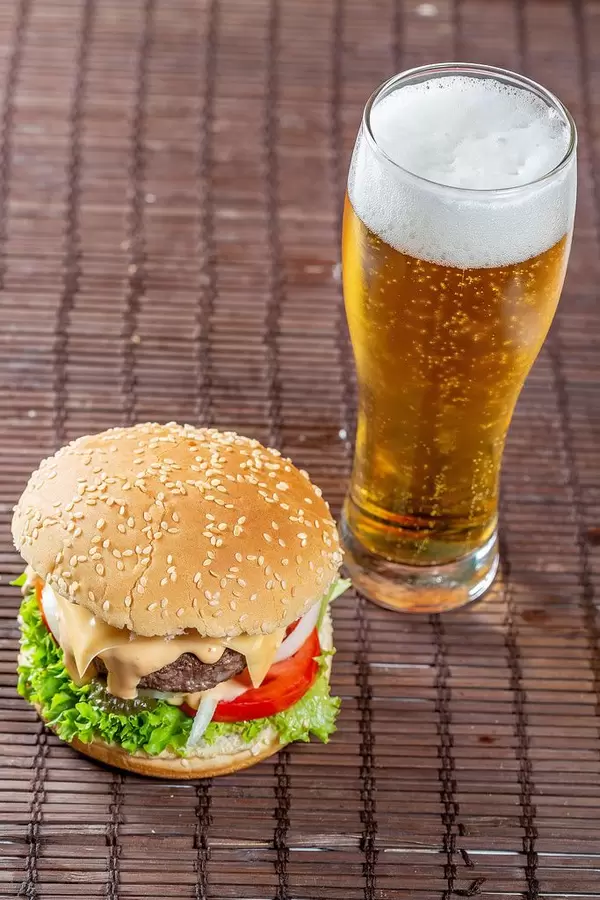 Homemade Burger with a glass of good beer
