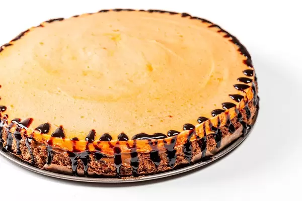 Homemade cake with chocolate biscuit, condensed milk and orange souffle (Flip 2020)