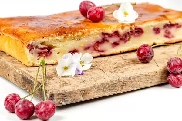 Homemade cherry pie on a wooden kitchen Board (Flip 2020)