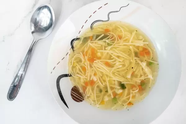 Homemade Chicken Soup with Vegetables on the table