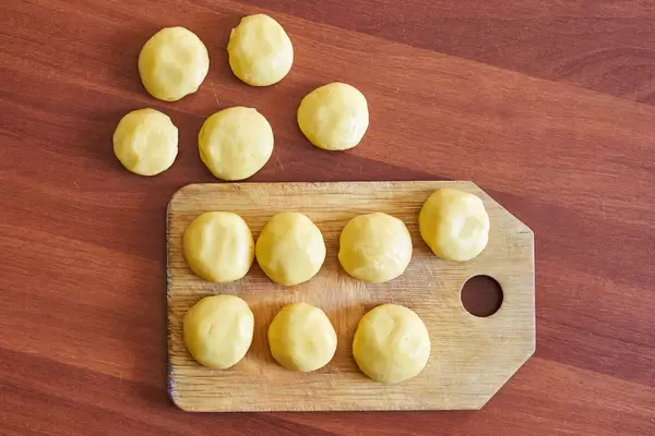 Homemade cookie dough on wooden cutting board