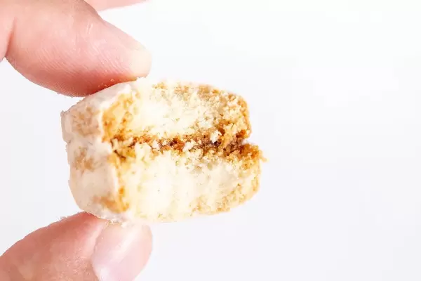 Homemade cookies Vanilice with sugar in the hand