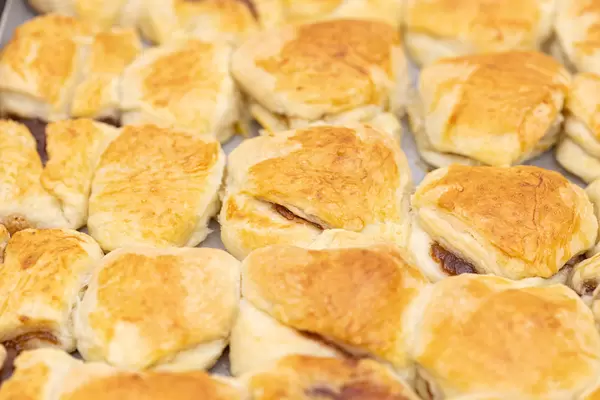 Homemade Crunchy Cookies with Jam filling in the baking tray