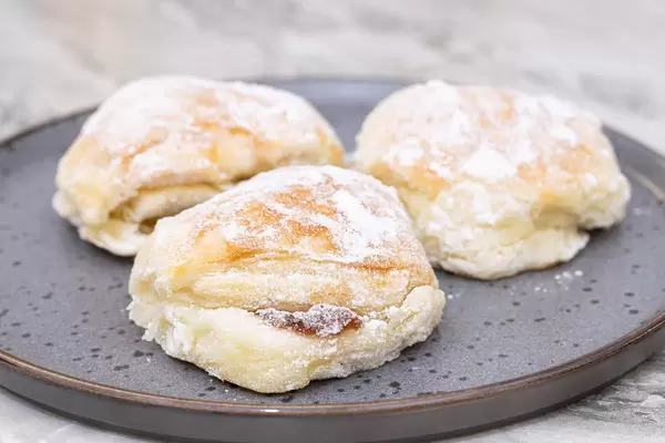 Homemade Crunchy Cookies with Jam filling served on the plate