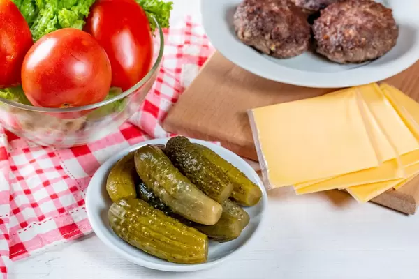 Homemade cutlets with fresh and pickled vegetables