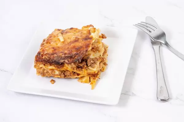 Homemade delicious Lasagna served on the plate (Flip 2019)