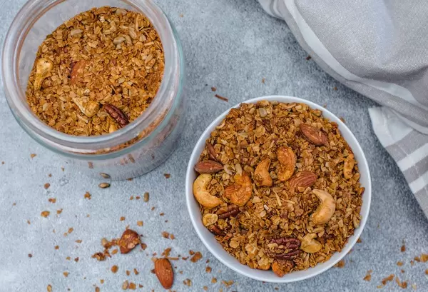 Homemade Granola with a white bowl Top View  (Flip 2020)