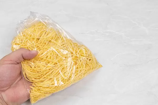 Homemade Pasta for the Soup package in the hand