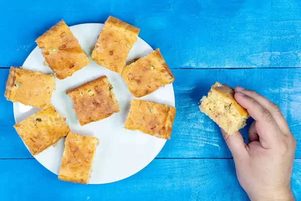 Homemade Pie with Cheese and Ham in the hand (Flip 2020)