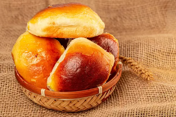 Homemade pies with cherries on a burlap background