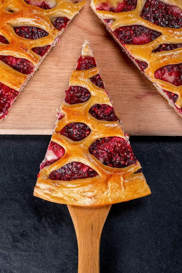 Homemade raspberry pie on the kitchen Board
