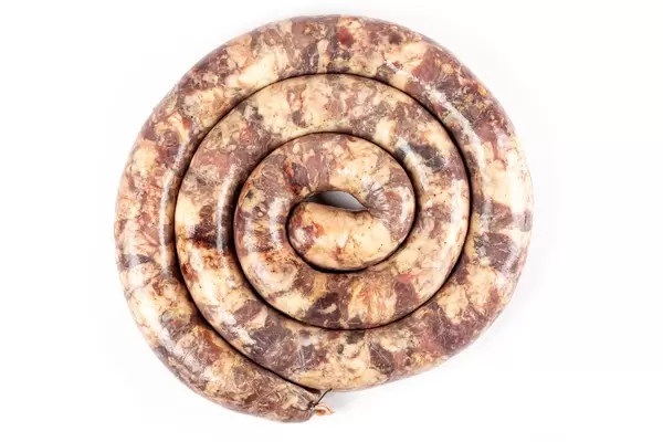 Homemade sausages spiral form, top view
