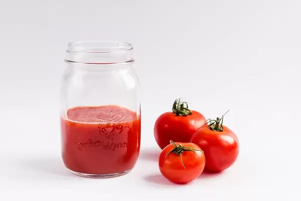 Homemade tomato juice in a jar