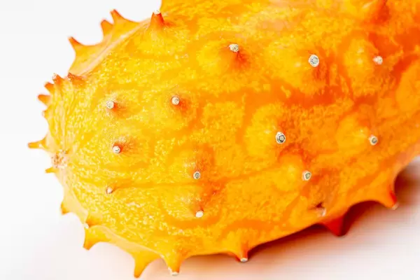 Horned melon or kiwano on white background (Flip 2020)