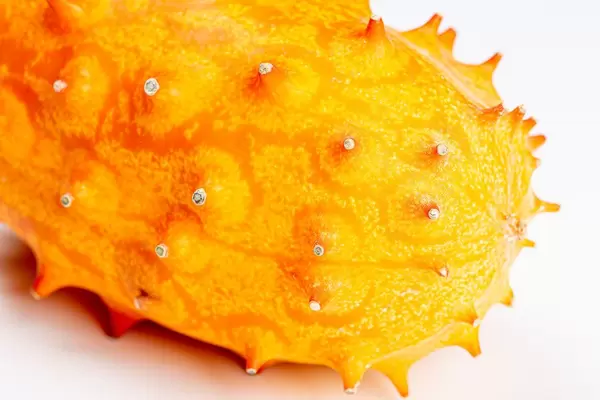 Horned melon or kiwano on white background