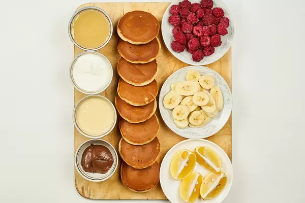Hotel breakfast on wooden board