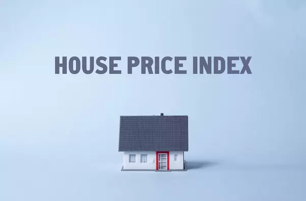 House on a light blue background with House price index text