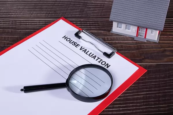 House valuation document on wooden table