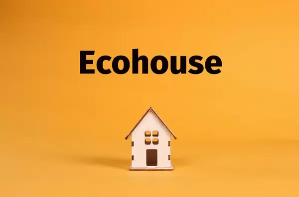 House with Ecohouse text on orange background