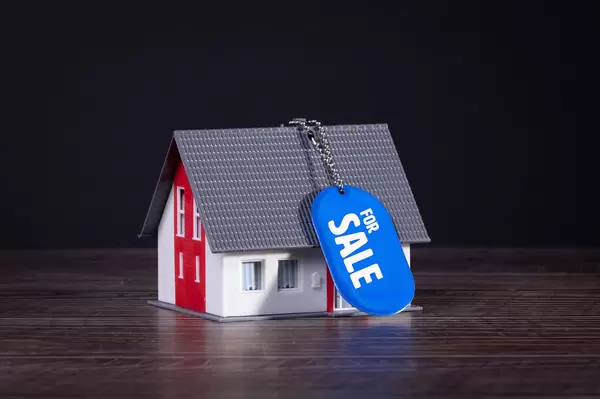 House with For sale label