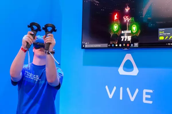 HTC Vive in action demonstrated with a game