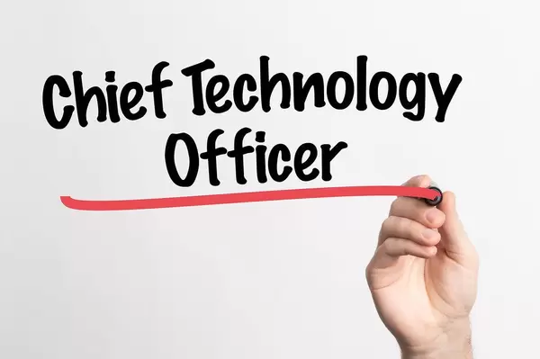 Human hand writing Chief Technology Officer on whiteboard