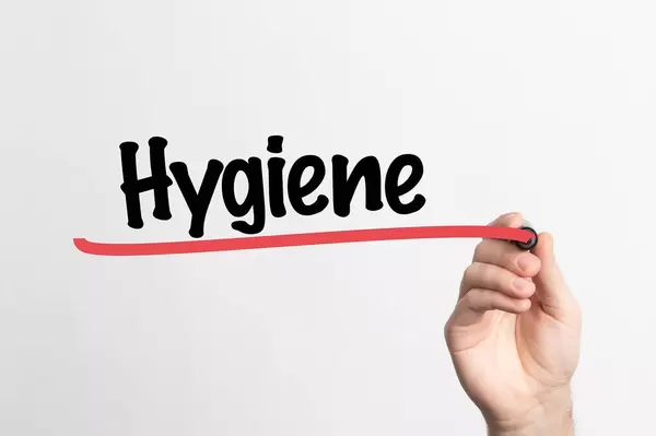 Human hand writing Hygiene on whiteboard