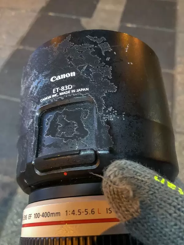 Ice crystals formed by frost and minus temperatures on the lens of a camera