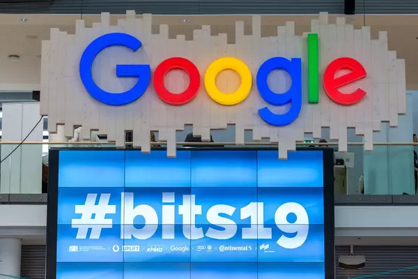 Illuminated Google lettering hanging from the ceiling, at bits19 - Bits & Pretzels conference