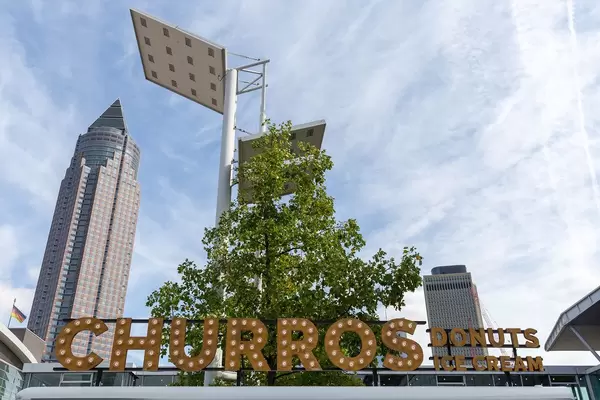 Illuminated lettering advertisement: Churros - Donuts Ice Cream