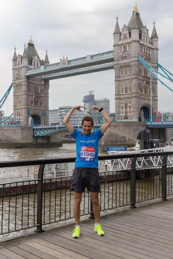 In Front of Tower Bridge in Style of "Mo Farah Sign"