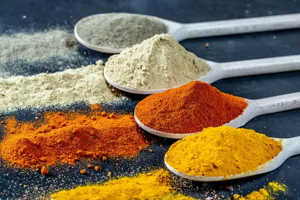 Indian colourful spices red chilli, Turmeric, Coriander and ginger powder. Selective focus