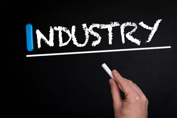 Industry text on blackboard