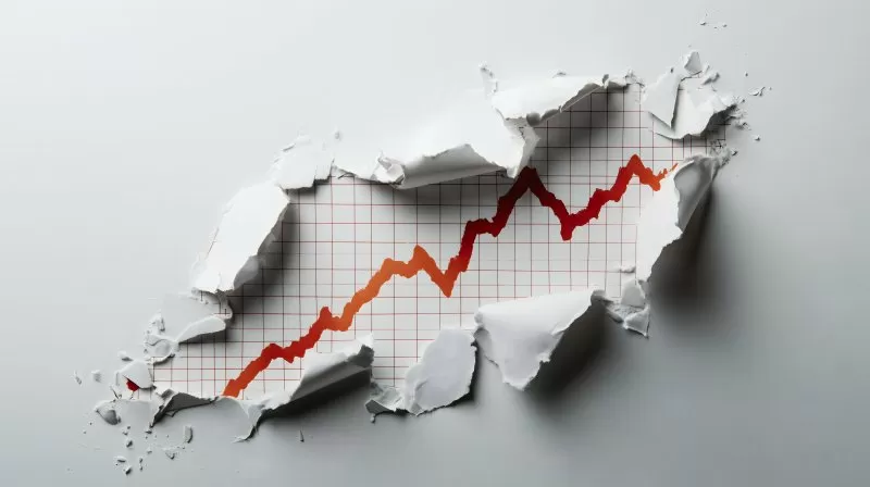 Inflation Diagramm mit steigender Kurve aufgerissenes Papier