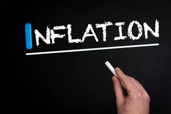 Inflation text on blackboard