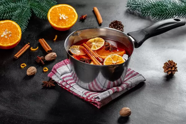 Ingredients for making mulled wine on a black background (Flip 2019)