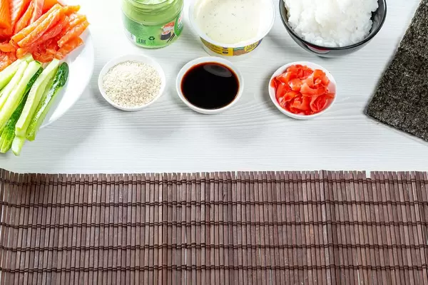 Ingredients for the preparation of rolls and sushi on a table. Food background