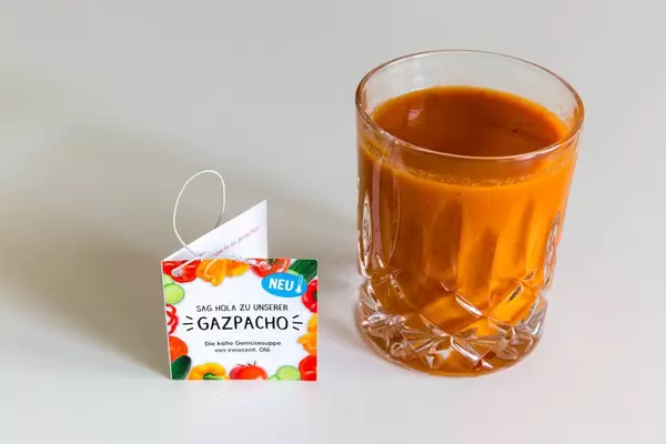 Innocent's new vegetable soup "Gazpacho" filled in a glass contains white wine vinegar, garlic, onions, lemons, tomatoes, red peppers and cucumber.