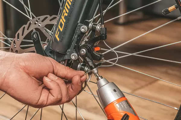 Installing brakes on a bicycle wheel