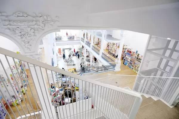 Interior view of modern bookshop with stairs