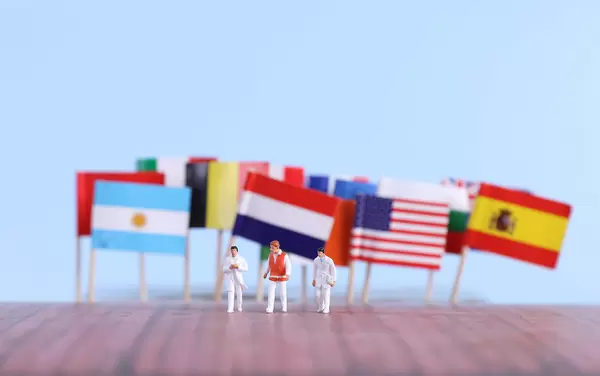 International flags and medical workers