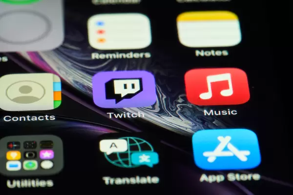 iPhone home screen with Twitch and other application icons