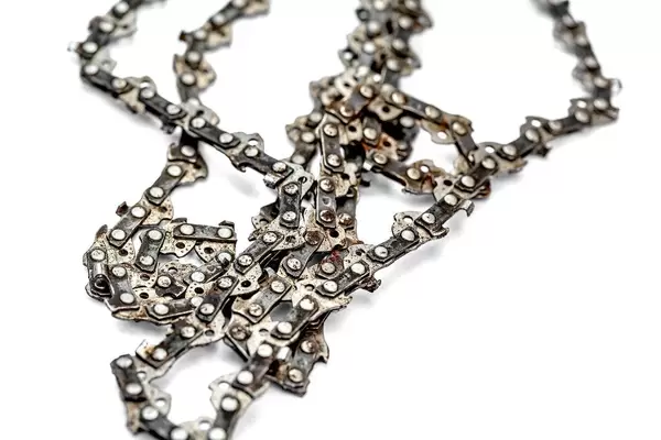 Iron chain-detail of a chainsaw on a white background