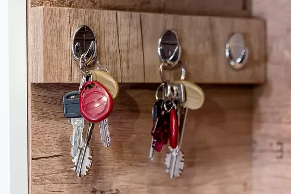 Iron keys hanging on hook