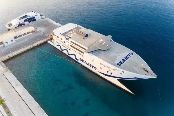 Island hopping by ferry and catamaran in the South Aegean. Seajets passenger boats in the port of Milos