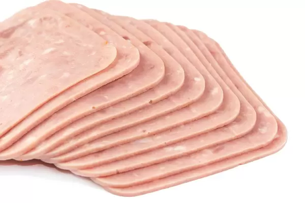 Isolated Sliced Square Ham above white background (Flip 2019)