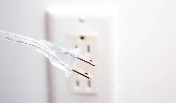Isolated white electric plug of type a