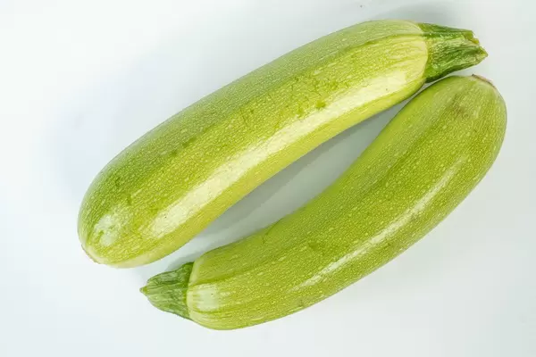Isolated Zucchini above white background