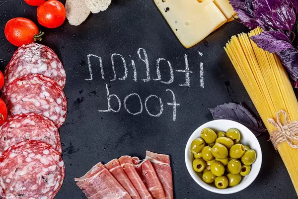 Italian food products with tag on black background (Flip 2019)